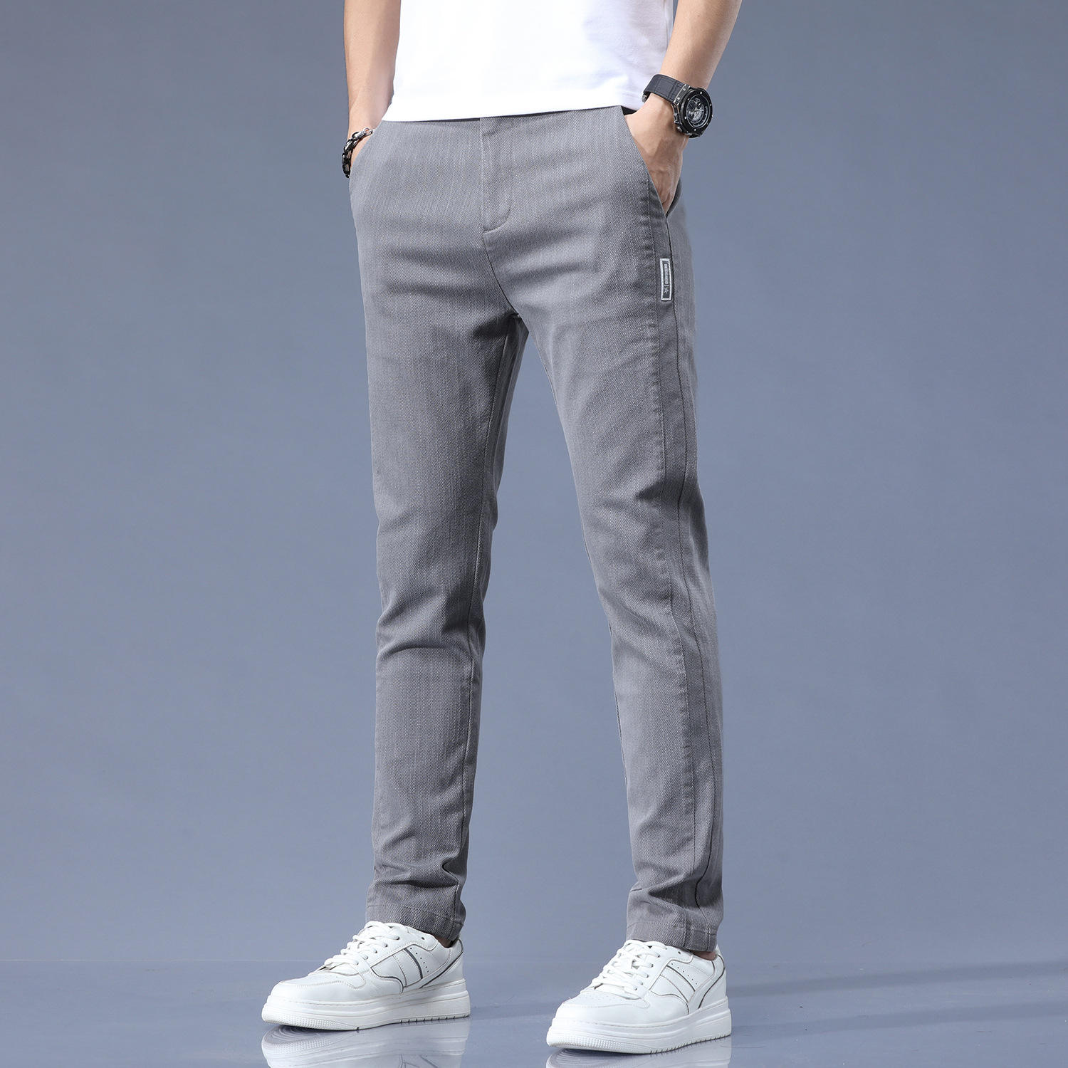 2024 new spring and summer men's casual pants men's handsome small foot pants elastic sports youth